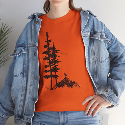Person wearing an orange t-shirt with a nature graphic and a denim jacket.